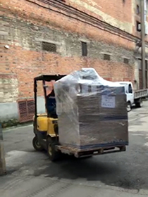 Image of the pallets being off loaded in Kyiv (Kiev)