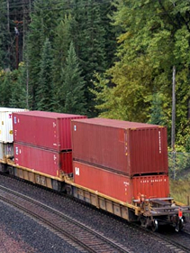 Image of containers being transported by rail